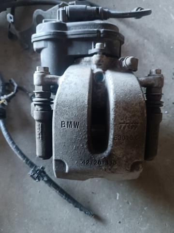 34216887385 BMW Суппорт тормозной задний левый купить в Ровно