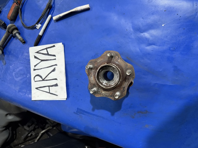 Подшипник в сборе со ступицей передний 402025MP0A NISSAN