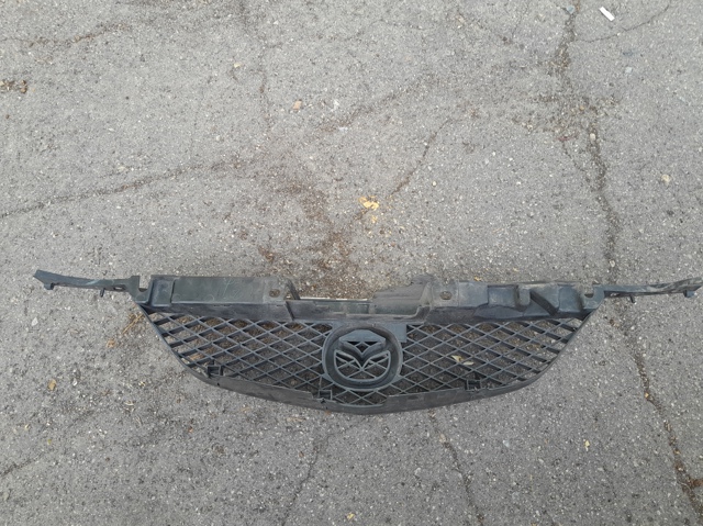 MAZDA C10050712 Решетка радиатора в наличии Кривой Рог