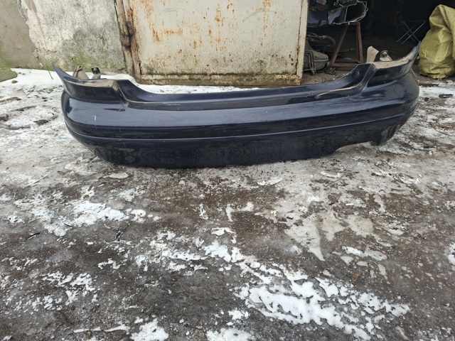 Задний бампер T0Y250221 MAZDA