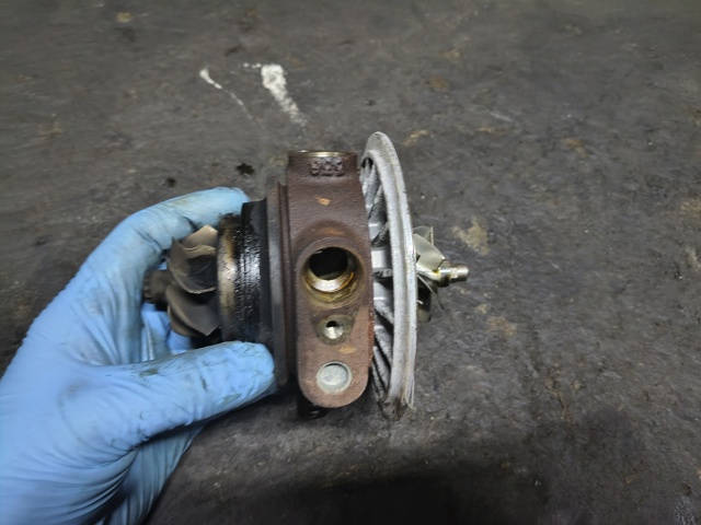 Насос вакуумный 06L145100F VAG
