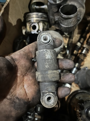 Натяжитель клинового ремня 117522W202 NISSAN