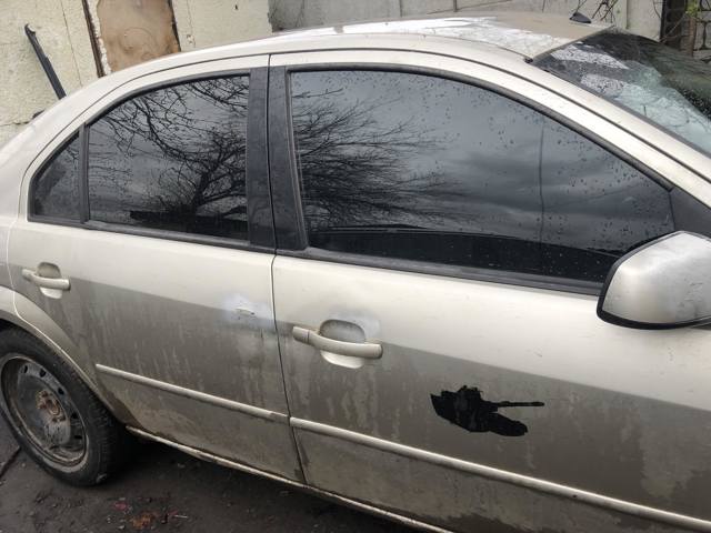 Стекло заднее правое 1303630 FORD