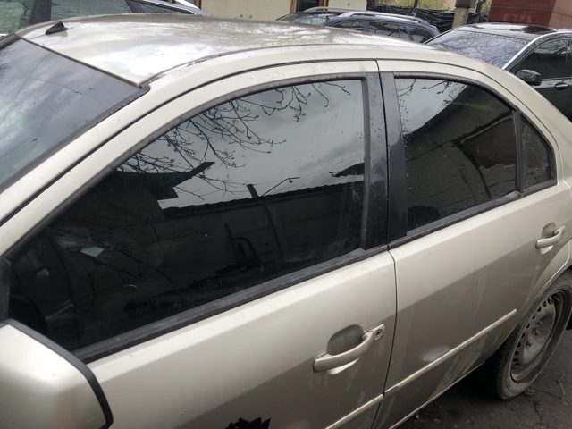 Форточка двери треугольник, задней, левой 1354386 FORD