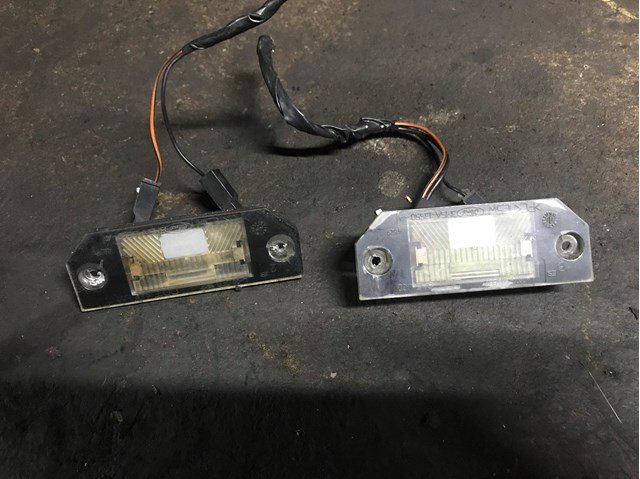 Фонарь подсветки заднего номера 4502331 FORD