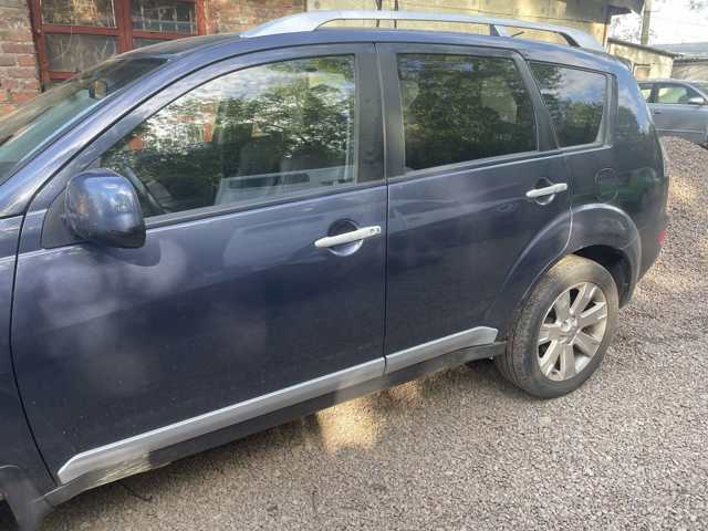 Стекло задней двери, левой 5736A021 MITSUBISHI