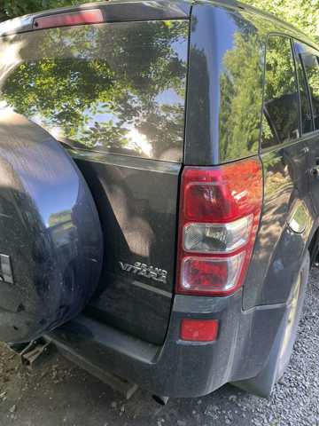 Бампер задний 7181165J10799 SUZUKI