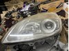 Вставка фары левой 7701064132 RENAULT