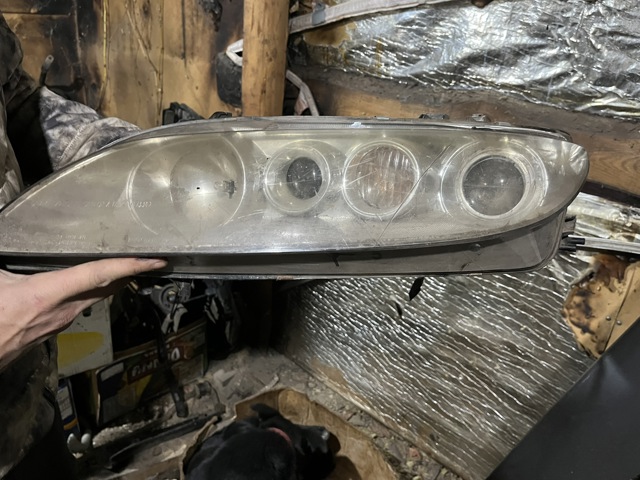 Вставка фары правой GJ6S51031B MAZDA