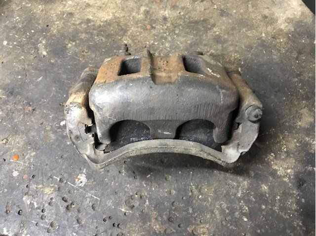 LC623371X MAZDA Суппорт тормозной передний левый купить в Житомир