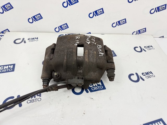Тормозной суппорт A0024205883 MERCEDES