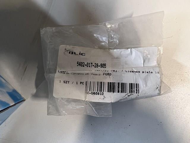 1332916 FORD Фонарь подсветки номерного знака купить в Сумы
