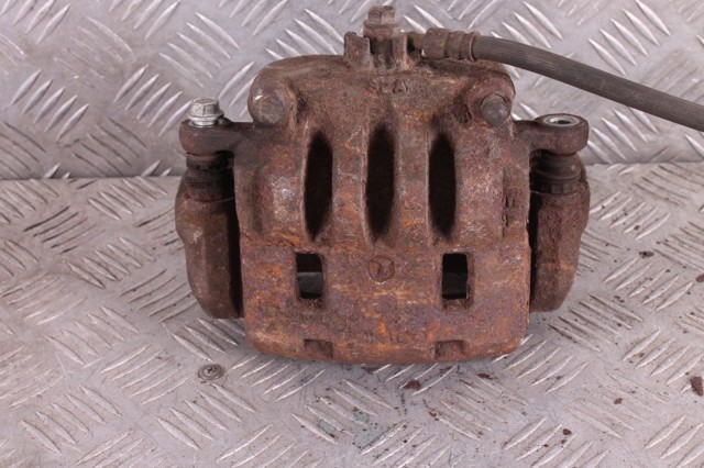 Суппорт тормозной передний правый 26292FE001 SUBARU