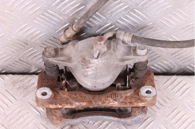 Суппорт тормозной левый задний 26692AJ010 SUBARU