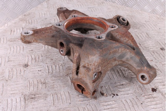 28411FG051 SUBARU Цапфа (поворотный кулак) задний левый купить в Каменское