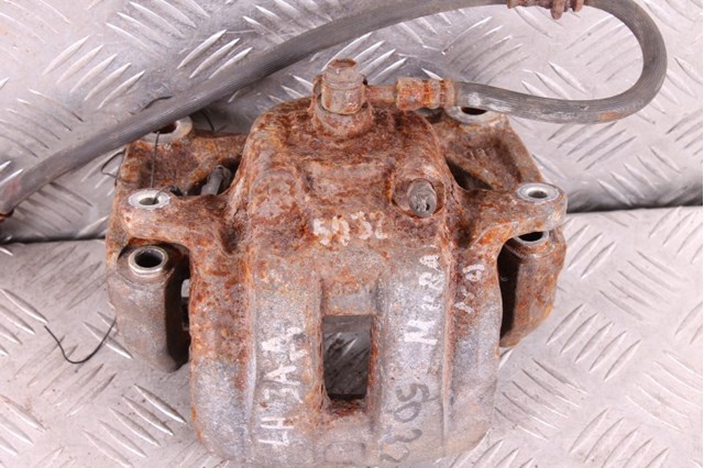 Супорт тормзной 410111AA0A NISSAN