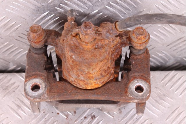 NISSAN 440111AA0A Суппорт тормозной задний левый в наличии Винница