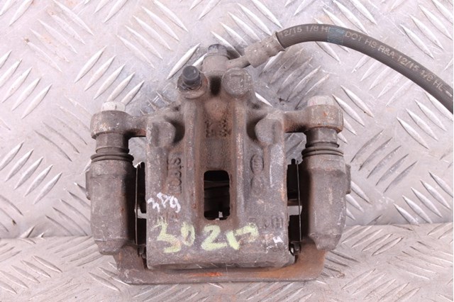 Задний левый суппорт 58210C1150 HYUNDAI