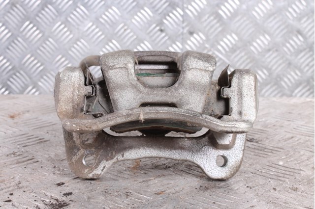 582303Q100 HYUNDAI Суппорт задний правый купить в Запорожье