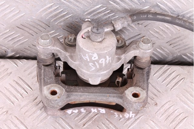 582303Q100 HYUNDAI Суппорт задний правый купить в Черкассы