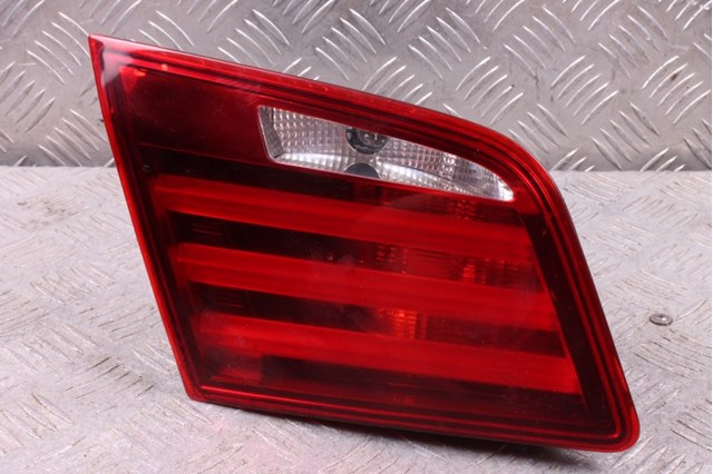 Задний левый внутренний фонарь 63217203225 BMW