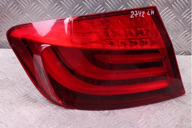 Фонарь задний левый, внешний 63217203231 BMW