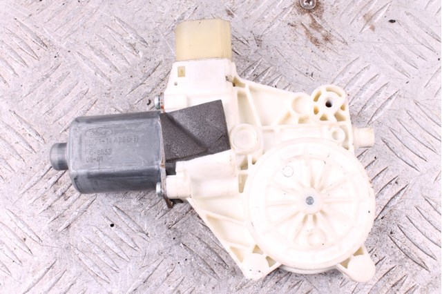 Мотор стеклоподъемника двери передней, левой 6M2114A389B FORD
