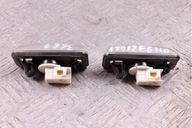 Фонарь освещения номерного знака 84912FG110 SUBARU
