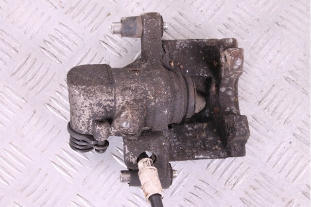 Тормозной суппорт правый задний 8M5Z2553L FORD