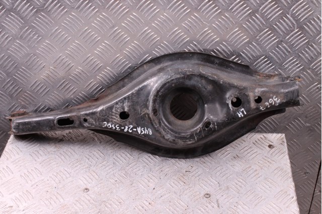 Рычаг задней подвески нижний, левый B45A28350C MAZDA
