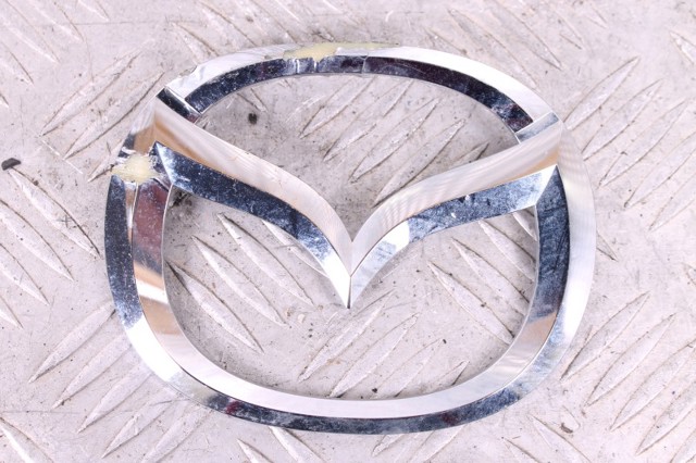Фирменный значек решетки радиатора GHP951731 MAZDA