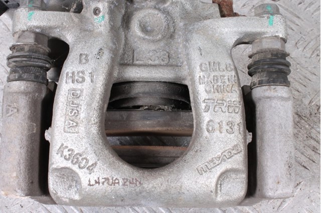 GHY92699ZA MAZDA Суппорт задний левый купить в Кривой Рог