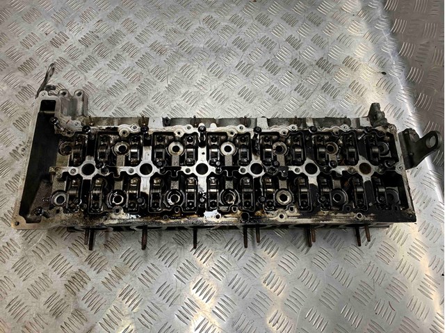 Головка блока цилиндров 11127800001 BMW