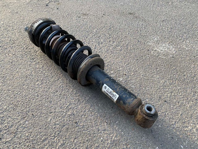 Стойка амортизатора задняя 33526796317 BMW