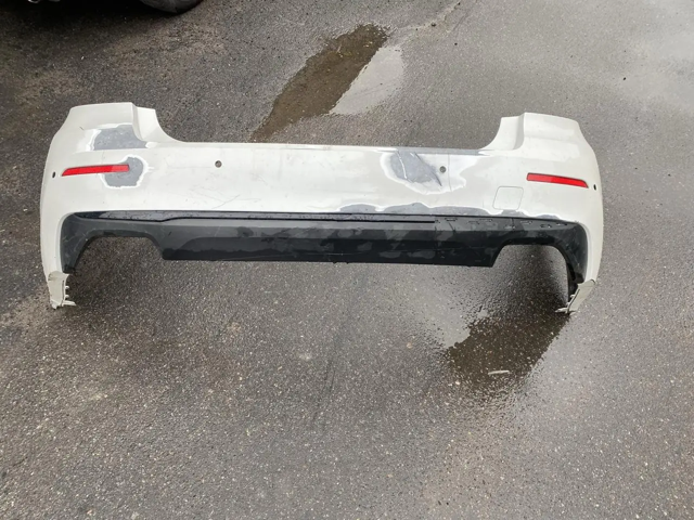 Бампер задний 51129852175 BMW