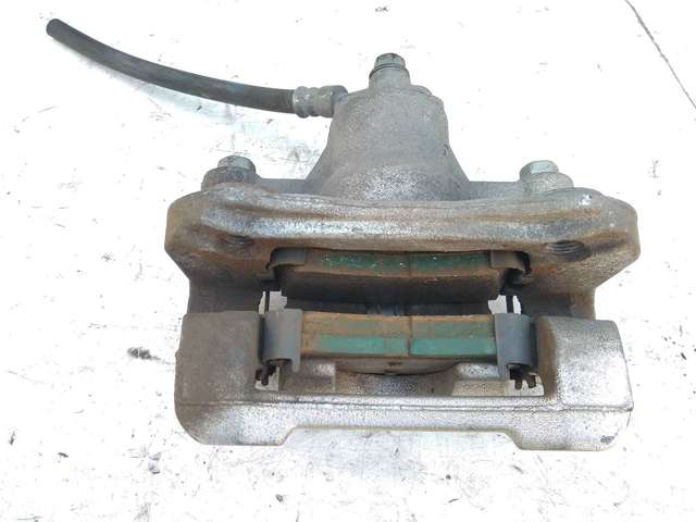 Тормозной суппорт задний левый 58310C1A00 HYUNDAI