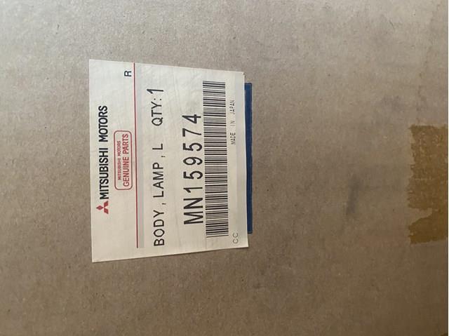 Фара дальнего света в сборе MN159574 MITSUBISHI