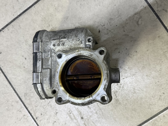Заслонка воздушная 06K133062D VAG