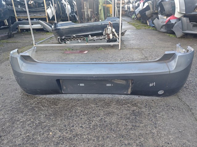 Бампер задний 09186137 OPEL