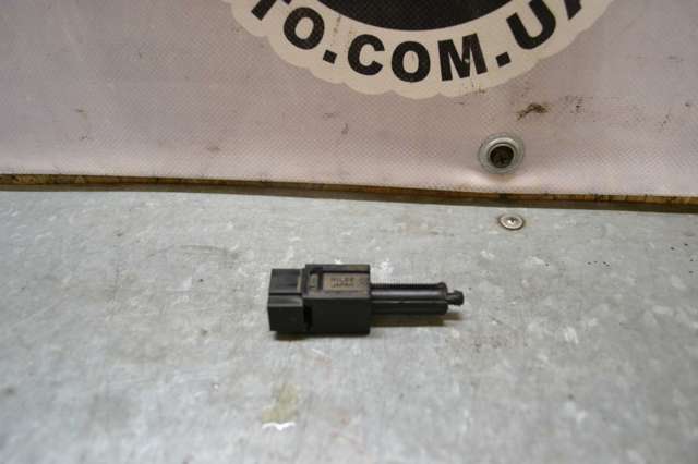 Датчик тормоза 25320AX00E NISSAN