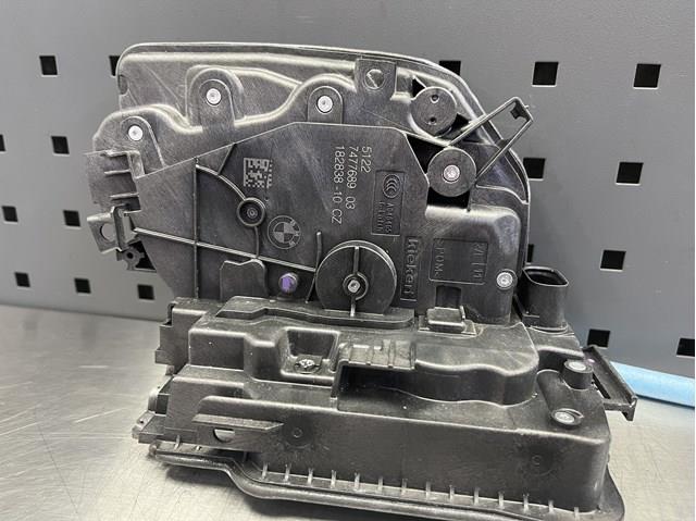 Замок двери задней левой 51227477689 BMW