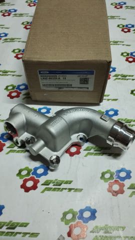 Фланец патрубка охлаждающей жидкости LX6Z8K556A FORD