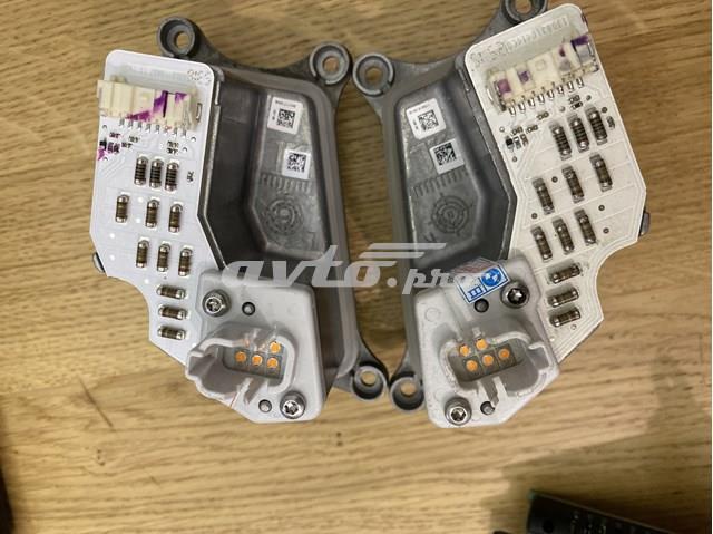 Модуль управления (ЭБУ) светом фар 63117406358 BMW