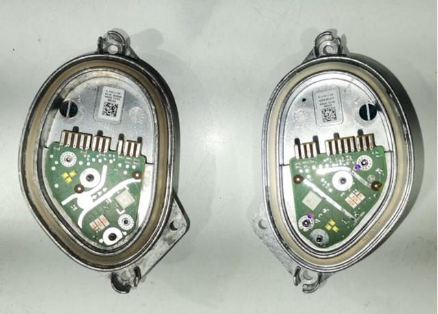 Блок упавления автосветом 63119477987 BMW