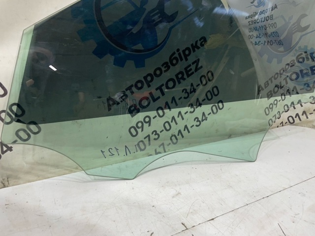 1303633 FORD Стекло двери задней левой купить в Ужгород