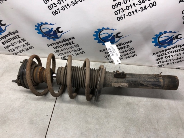 Стойка амортизатора передняя 1305642 FORD