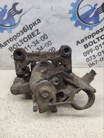 1738987 FORD Суппорт тормозной задний правый купить в Днепр