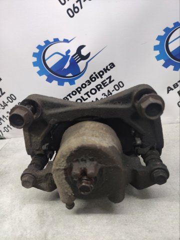 Суппорт тормозной, передний, правый 41001EJ20A NISSAN