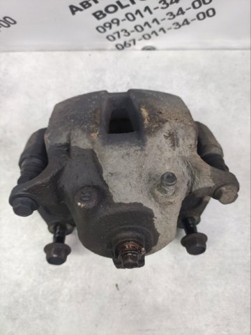 41001EJ20A NISSAN Суппорт тормозной передний правый купить в Киев
