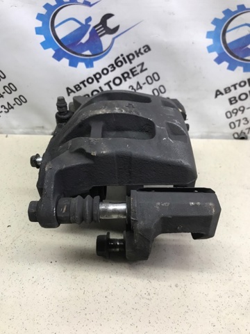41011EJ20A NISSAN Суппорт тормозной передний левый купить в Павлоград